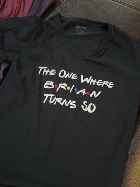 Gildan Black Graphic Tee with Multicolor Dot Accents